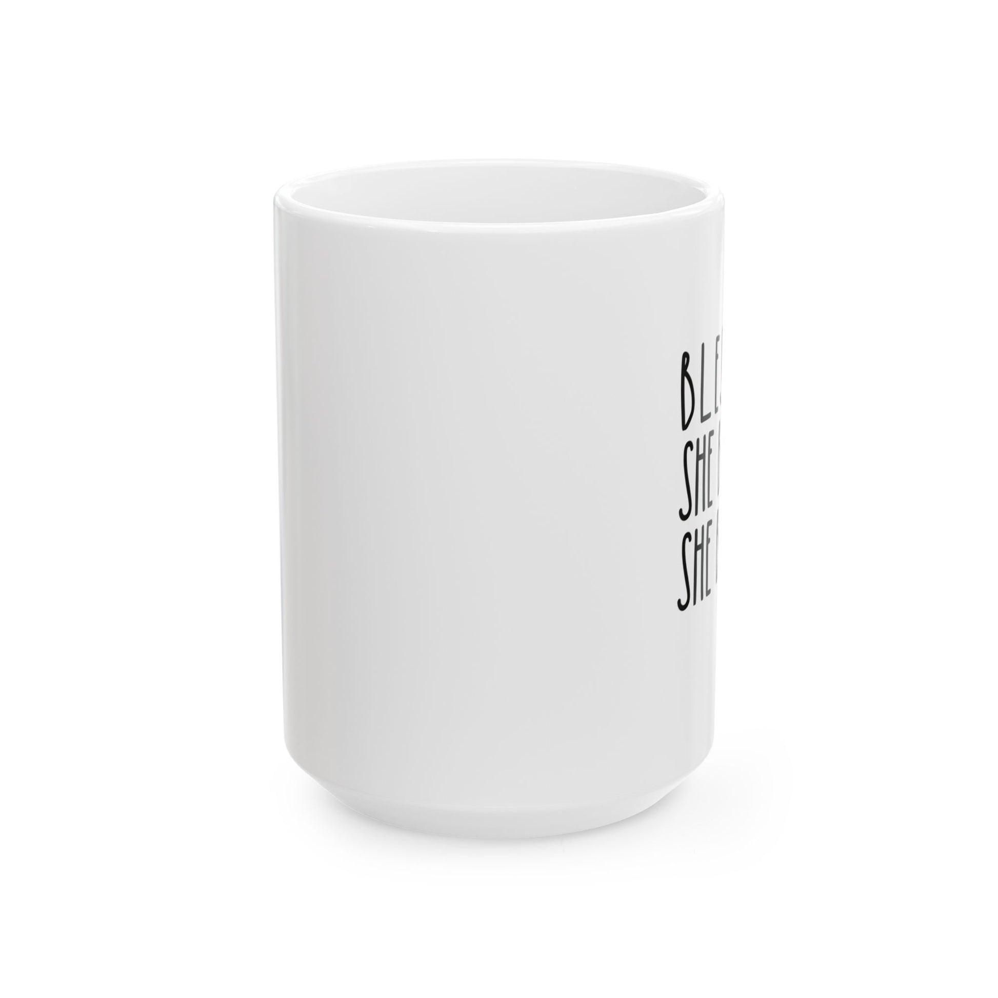 Side View of a ceramic white Muc That reads Blessed is she because she believed. Bibly Verse from Luke 1:45